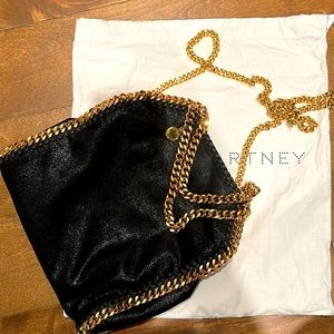 Stella Mc Cartney classic black gold cross body bag very gently used almost new